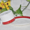 colored ceramic cup and saucer